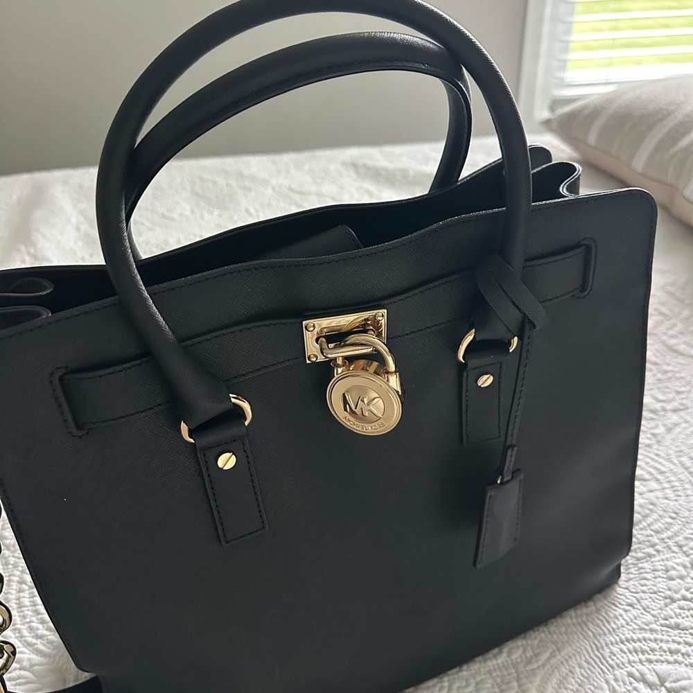 Michael Kors briefcase / purse / tote bag
Like new condition, only used twice.